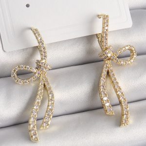 Pirinç Gold Renk Zirkon Taşlı Kurdele Model Kadın Küpe - Görsel 1