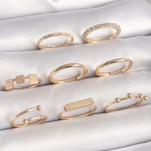 Pirinç Gold Renk Goemetrik Sembol Model Zirkon Taş Detaylı Kadın Yüzük Kombini - Görsel 1