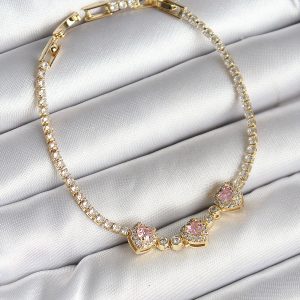Pirinç Sıralı Pembe Kalp Figürlü Zirkon Taşlı Gold Renk Kadın Bileklik - Görsel 1